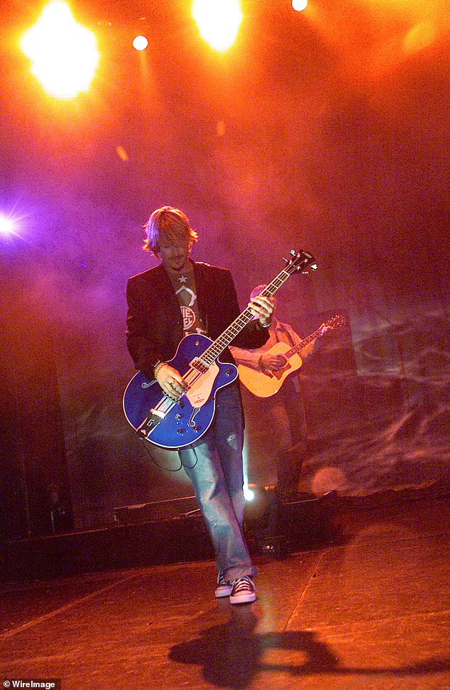Charlie performing at a Train In Concert in 2003