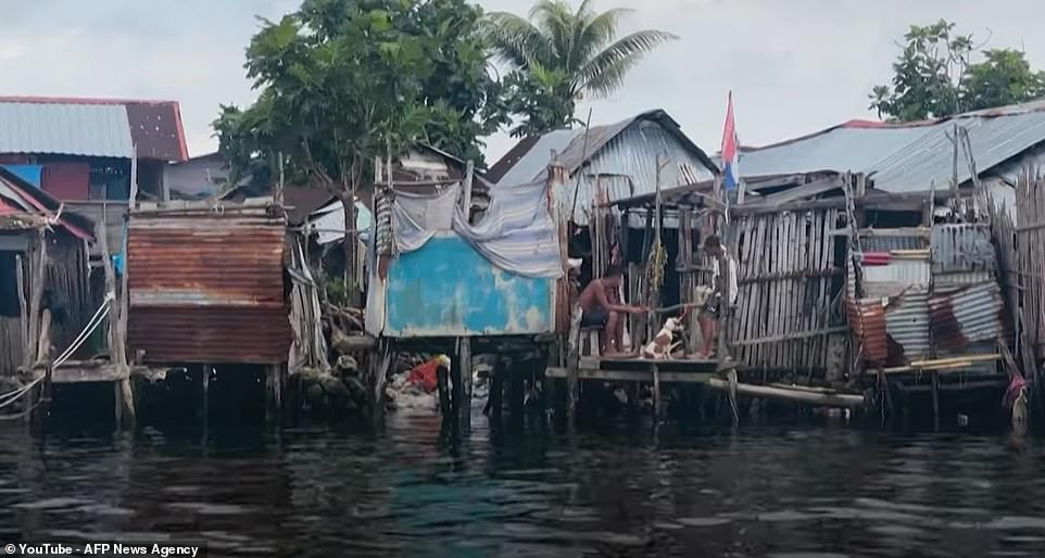About 2,000 people live on the small rock, which measures about 400 by 150 meters, and in one scene the camera pans to show how many houses have been built on stilts due to constant flooding.
