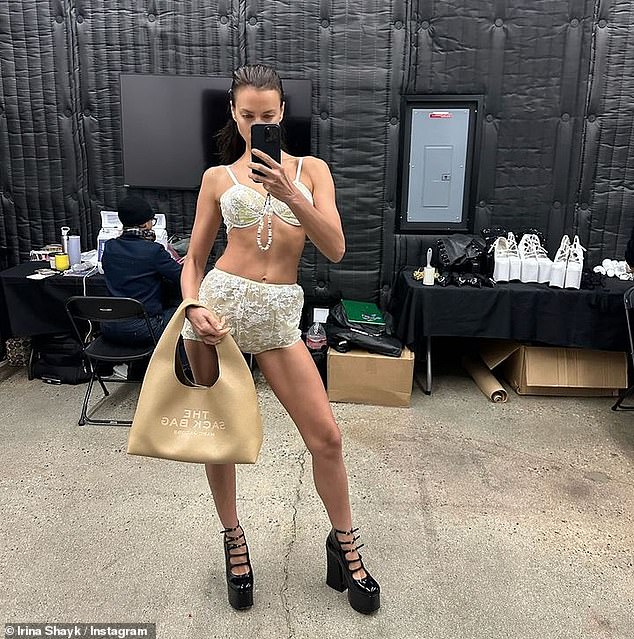 She also uploaded a behind-the-scenes selfie wearing black closed-toed platform heels as she enjoyed time on set