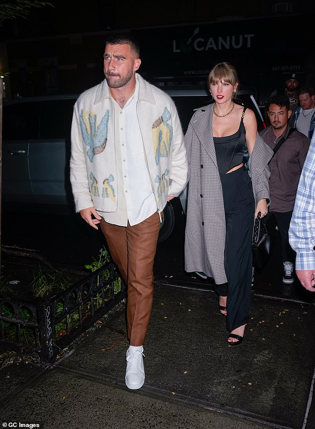 Fans noticed evidence of her romantic and intimate trip with boyfriend Travis Kelce as she sat at the piano performing songs from her Evermore era;  seen in New York City in October 2023