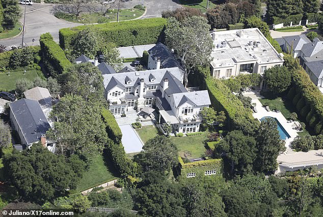 Aerial photos obtained by DailyMail.com on Tuesday showed the 10,000-square-foot mansion he is believed to have been living in for the past few weeks