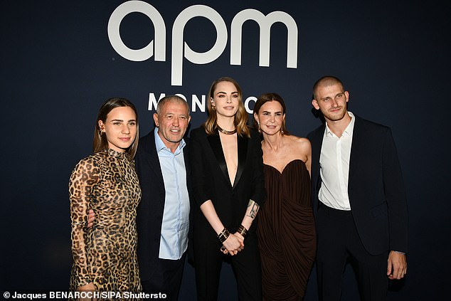 Cara was front and center as they took photos at the event