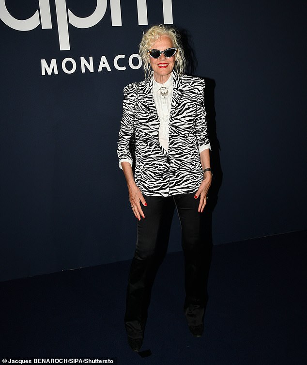 Ellen von Unwerth looked stylish in a zebra print jacket and white shirt