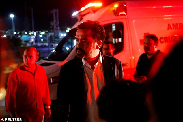 Civic Movement president Jorge Alvarez Maynez reacts at the site after a gust of wind caused a building to collapse, resulting in several deaths and injuries, during a campaign event for the Civic Movement party in San Pedro Garza Garcia