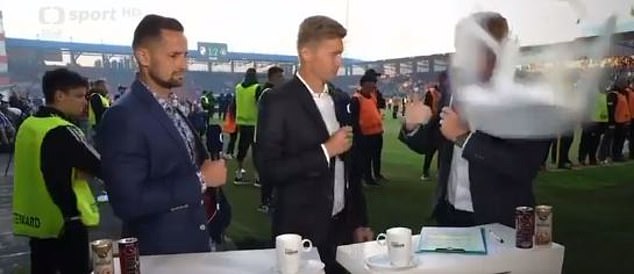 Presenters covering the match for Czech television were targeted by a flying plastic chair