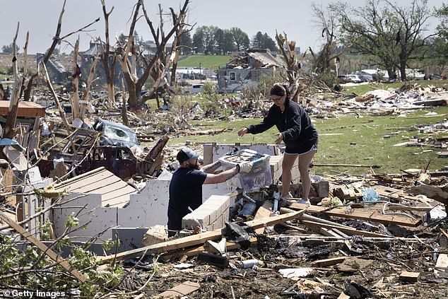 Images from Greenfield showed a wide swath of total destruction, with homes reduced to splinters, trees uprooted, vehicles crushed and debris strewn everywhere.
