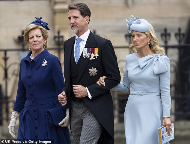 Queen Anne Marie of Greece with Crown Prince Pavlos of Greece and Crown Princess Marie-Chantal of Greece at the coronation of King Charles last year