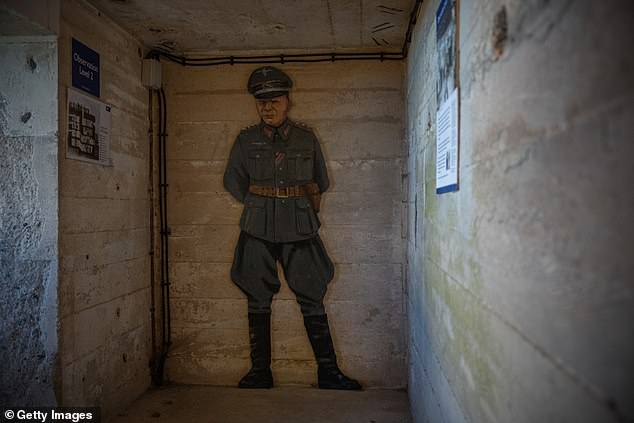 A model of a German officer is on display at The Odeon, a 15-metre-high concrete naval rangefinder tower built by forced laborers on Alderney