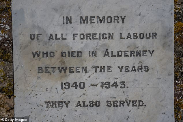 A plaque on the island of Alderney reads: 'In memory of all foreign workers who died in Alderney between 1940 and 1945.  They served too.”