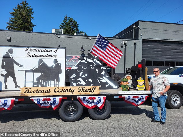 Horst said the Kottenai County sheriff was part of the Fourth of July parade, waving at residents from a pickup truck with a revolver against his hip.  A photo of last year's parade can be seen here