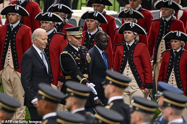 Biden approached a podium to speak before catching himself waiting for a military honor guard
