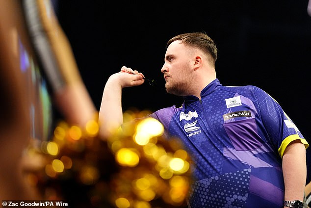 1716500007 784 Luke Littler hits STUNNING nine dart finish on his way to