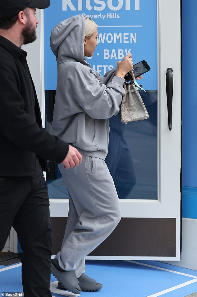 The 42-year-old reality star rocked a casual ensemble of gray sweats as she visited Kitson in Beverly Hills