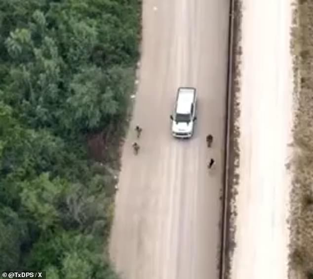 Border Patrol agents rushed the group before they could scale the wall