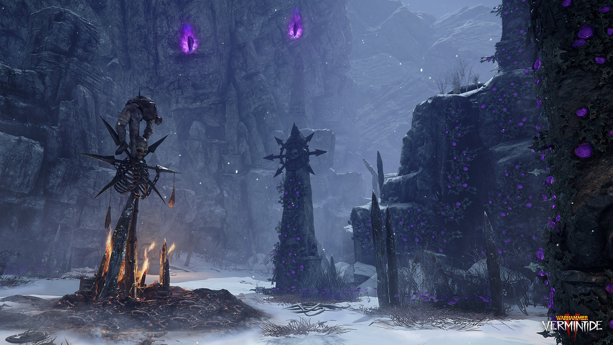 A screenshot of Vermintide 2, showing shrines built to Chaos, built in a snowy winter valley