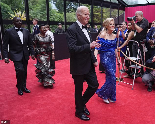 President Joe Biden and first lady Jill Biden enter the outdoor pavilion with Kenyan President William Ruto and first lady Rachel Ruto