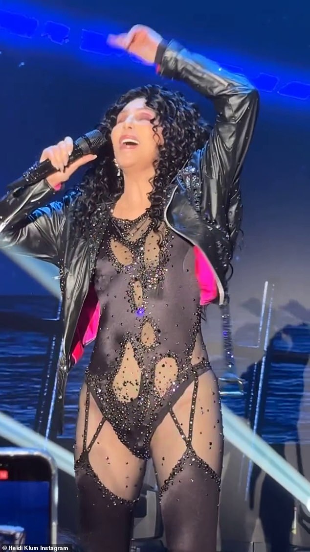 Cher was also pictured performing in the evening in a clip that model Heidi Klum posted to her Instagram