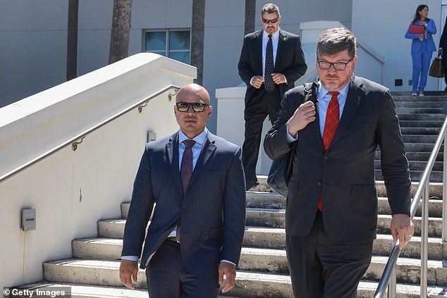 Trump aide Walt Nauta (left) leaves court with attorney Stanley Woodward (right).  Woodward says there is prosecutorial misconduct in the case, alleging that special counsel Jack Smith's team suggested Woodward not be appointed to the judiciary unless Nauta, his client, cooperated.