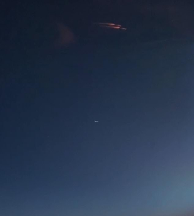 A stunning photo taken by a Fedex pilot of a meteor burning up in the atmosphere, with a white blob underneath that resembles the objects captured by Vernet and the other witnesses he collected