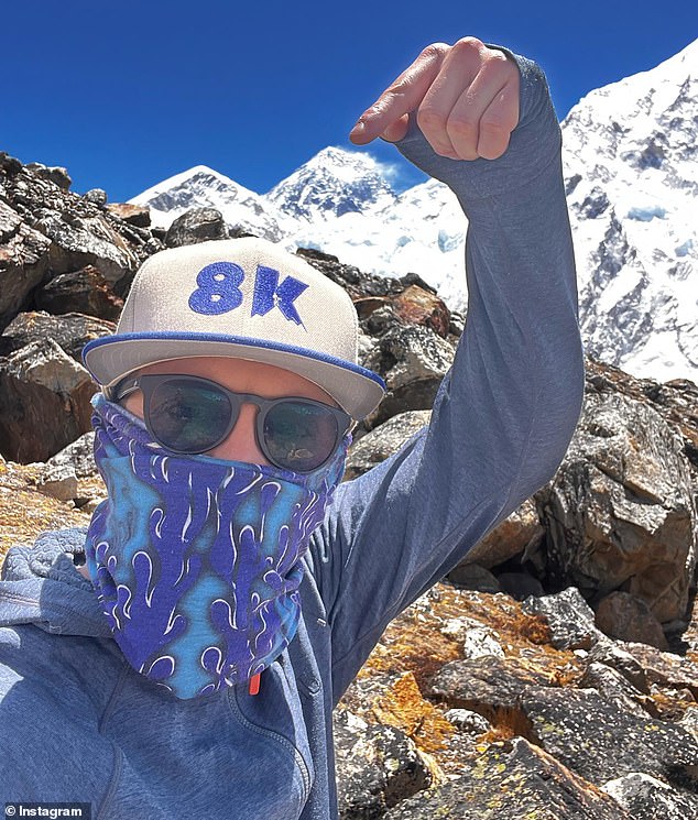 Missing Daniel Paul Paterson, 40, is pictured on May 11 ahead of his climb to the summit