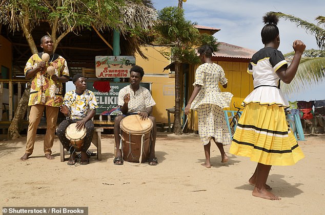 Above, locals performed a traditional Garifuna performance in the village of Hopkins