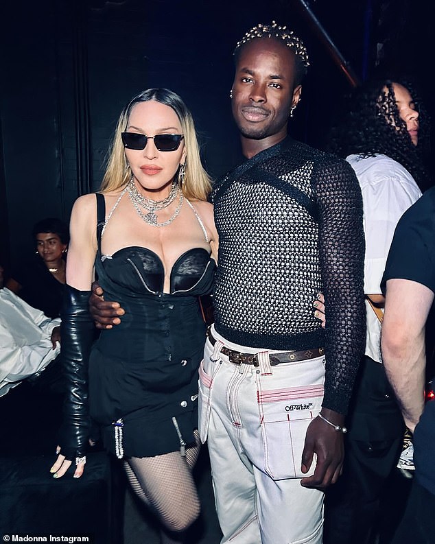 IB Kamara (R), the creative director of the clothing brand Off-White, also spoke to Madonna during the bash