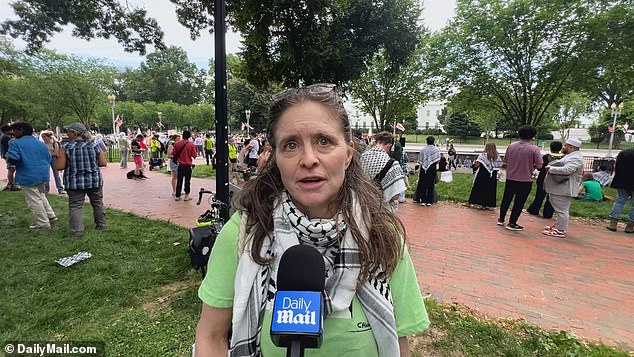 Adrienne said she knew which river and sea the protesters were singing about, but declined to say which before walking away from the interview.