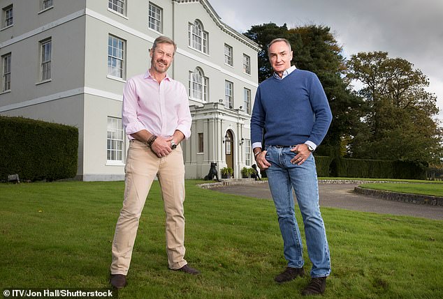 Lord Mountbatten and his husband, James Coyle, a director of air cabin services in Glasgow, plan to stay in the property whatever happens.  Pictured: the couple outside the building in 2021