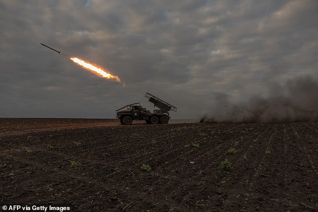 Ukrainian forces fire a Grad multiple rocket launcher towards a Russian position on May 15