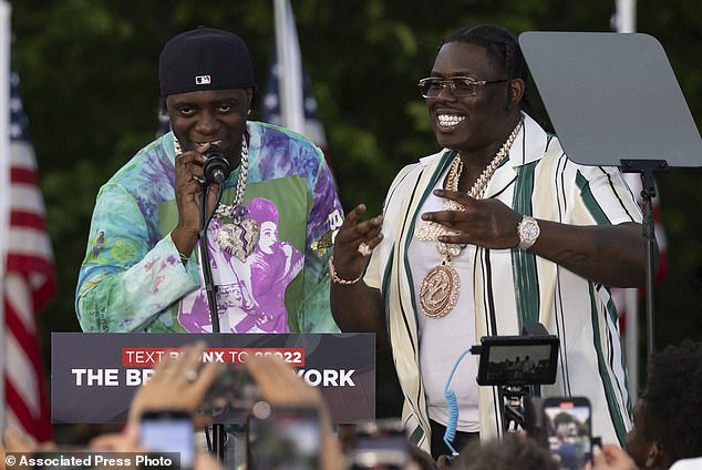 Rappers Sheff G, right, aka Michael Williams, and Sleepy Hallow, aka Tegan Chambers, join Republican presidential candidate, former President Donald Trump, at a campaign rally in the south Bronx