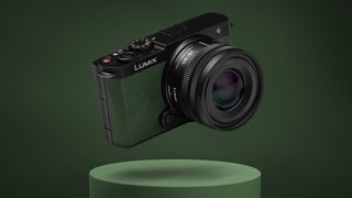 Panasonic Lumix S9 in the color Dark Olive on an olive-colored background