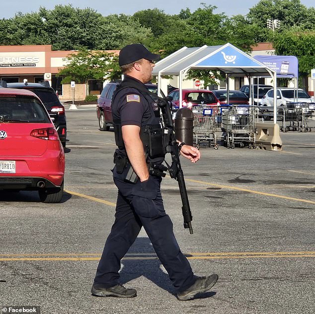 Police stood guard at the store Friday after it closed