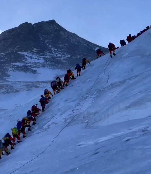 Climbers photographed near the Hillary Step, just below the summit at about 8,800 meters altitude, where the ice collapsed on Tuesday