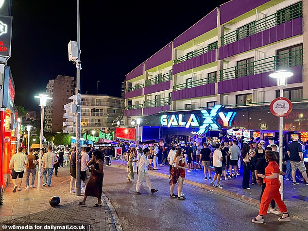 Brits enjoy a boozy night on the strip in Magaluf, Mallorca