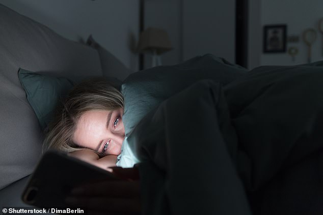 Avoid using electronic devices such as smartphones, computers or tablets before going to bed (stock image)