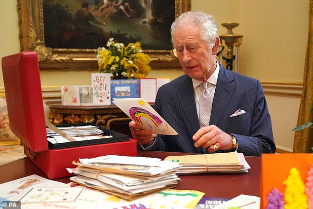 Charles III reads cards and messages sent by well-wishers at Buckingham Palace following his cancer diagnosis