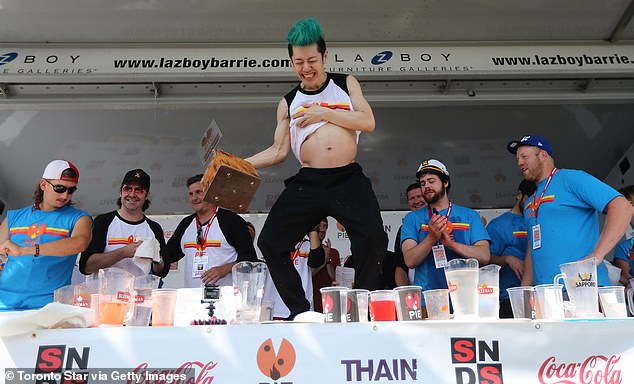 Kobayashi defends his pizza eating title at 'Let Them Eat 5' by eating 62 slices during Kempenfest on the waterfront in Ontario, Canada