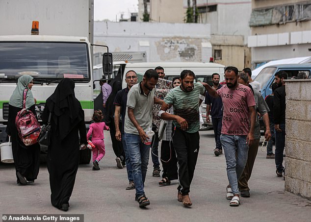 The injured are taken to Al-Ahli Baptist Hospital in Gaza City after the Israeli army attacked the Al-Nazla school building on May 25, 2024.