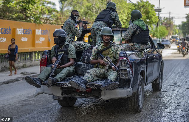 Members of the Haitian Armed Forces patrol the streets of Port-au-Prince, Haiti, Saturday, May 11, 2024