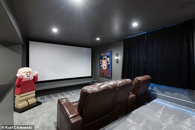 Pictured: the home theater, complete with Home Alone decor