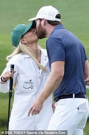 The pair shared a kiss on the court at Augusta