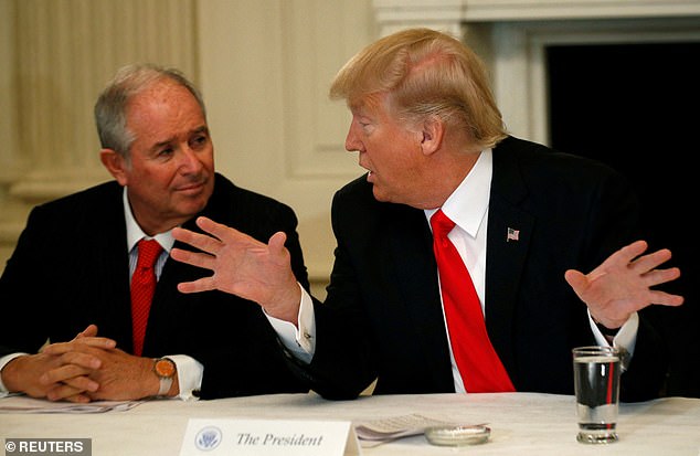 Blackstone CEO Stephen Schwarzman listens to then-US President Donald Trump during Trump's strategy and policy forum with CEOs of major US companies at the White House in Washington, February 3, 2017