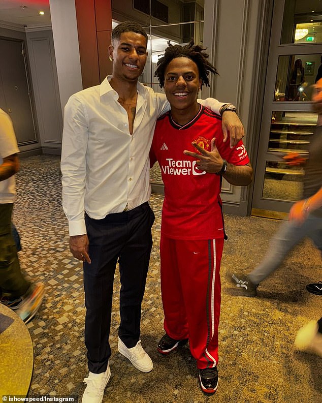 IShowSpeed ​​​​(right) posted several photos of himself and the Man United team at the party on his Instagram, with the YouTuber here posing with Marcus Rashford (left)