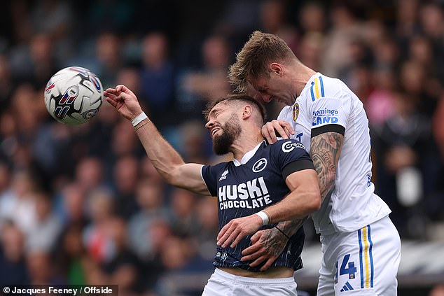 Rodon clashes with Millwall's Tom Bradshaw during last September's match at The Den