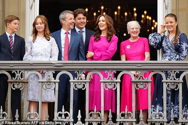 Pictured: Frederik and Mary were joined on the balcony by their four children Crown Prince Christian (center), 18, Princess Isabella (far right), 17, and twins Prince Vincent and Princess Josephine (left), 13, and Queen Margrethe, 84