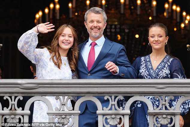 The father-of-four celebrated his first birthday since taking the throne today and greeted crowds of royal fans gathered outside the residence.  In the photo with daughters Josephine (left) and Isabella (right)