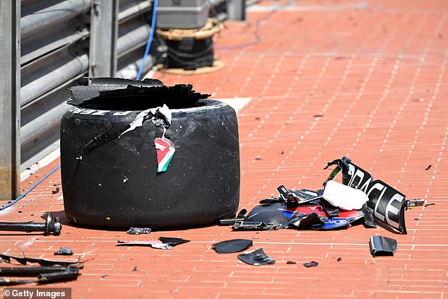 Debris from Perez's car was sent around the circuit after the crash with Magnussen