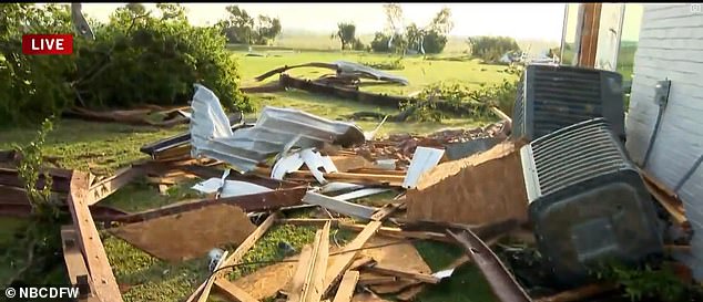 A Valley View home was pictured Sunday surrounded by debris after a tornado