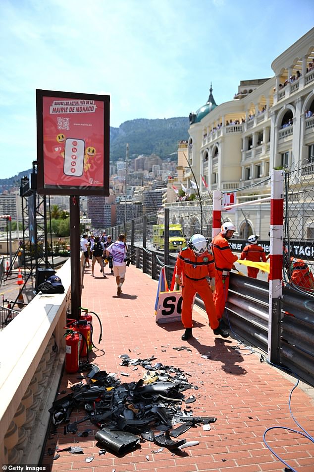 The marshals were forced to clear a significant amount of debris before racing could resume