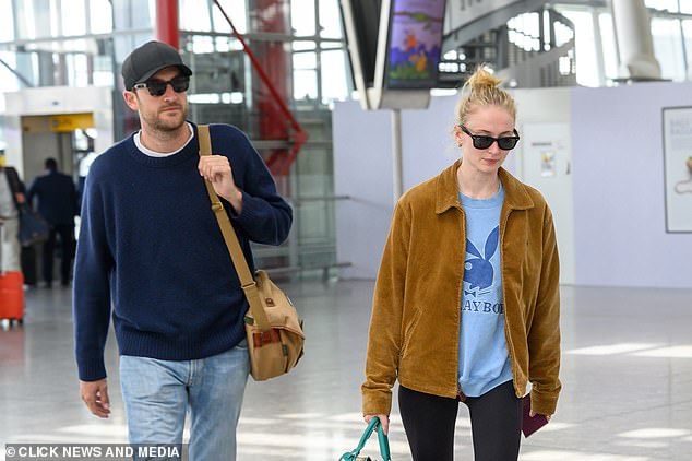 Sophie and Peregrine walked through the airport